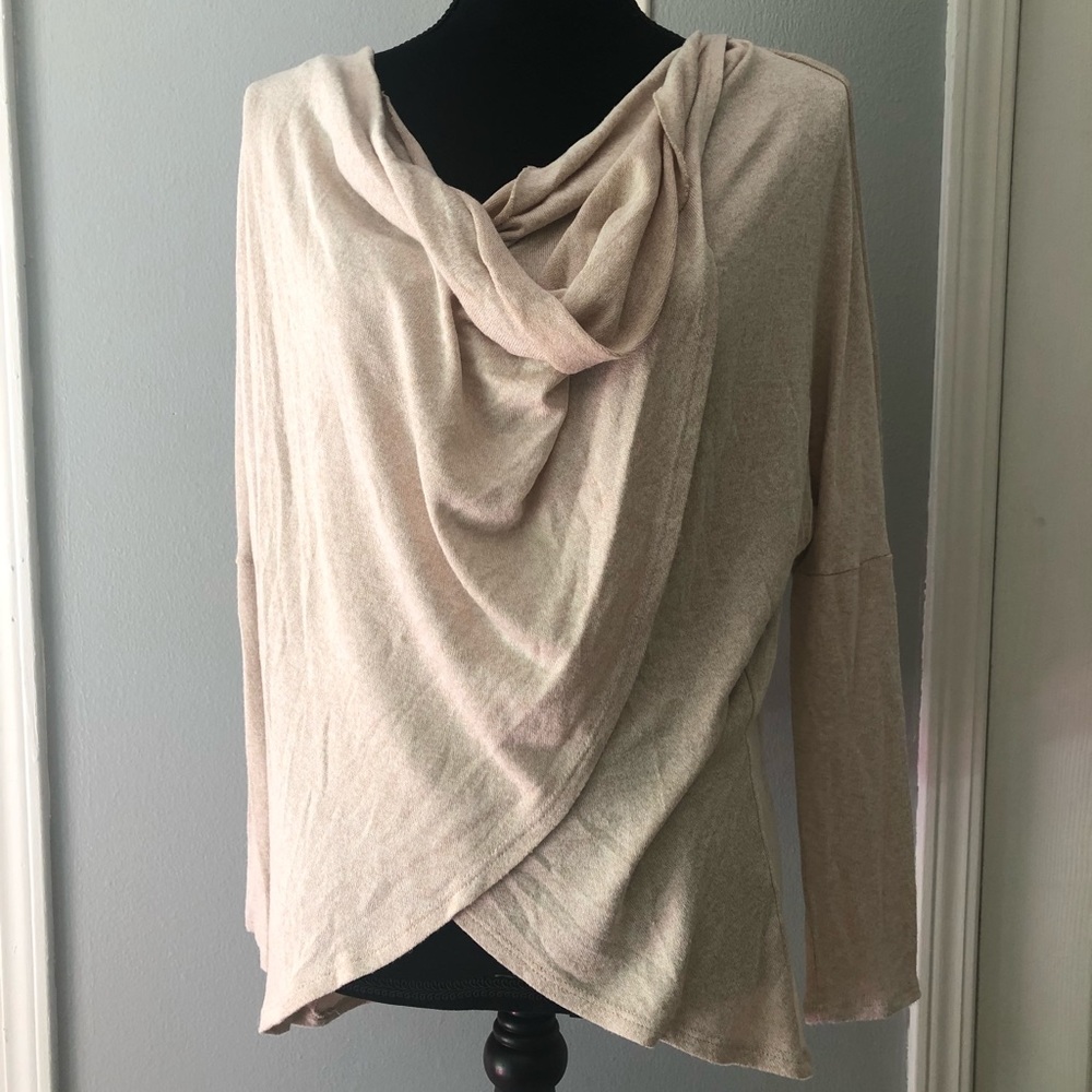 Cream colored long sleeve top. Never worn.
